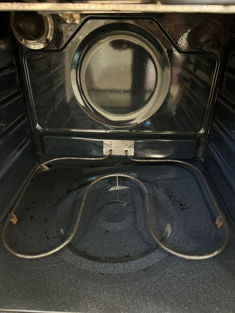 Dishwasher after cleaning by Amanda’s Elite Services
