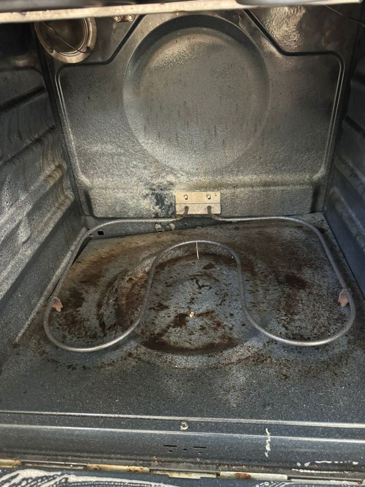 Dishwasher before cleaning by Amanda’s Elite Services